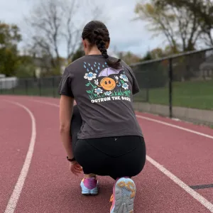 Outrun the Rain Women’s High Tee